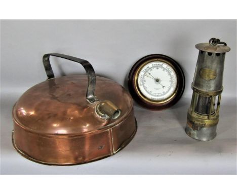 A large copper flat based kettle, with wrought iron handle 37cm diameter, together with a further brass and steel miners lamp