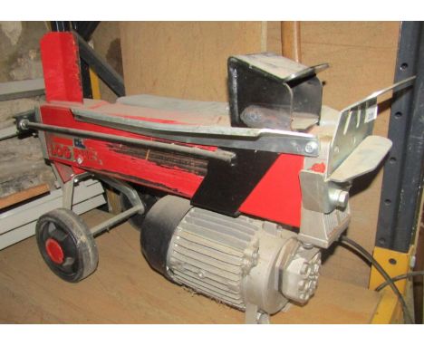 A Clarke Electric Power Log Buster 2, together with a Stihl Smart Holder with folding framework and a long handled tree felli