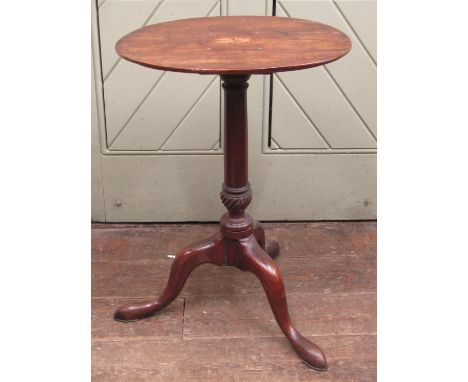 A Georgian occasional table, the oval top raised on a gun barrel pillar and tripod base 