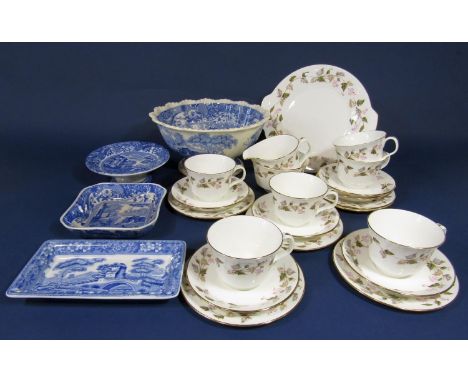 A six place Minton Fortune pattern tea service including milk jug, sugar bowl, cake plate, six cups, six saucers and six tea 