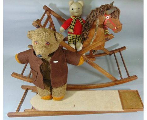 Vintage wooden rocking horse, length 84cm, together with a toy ironing board, knitted Rupert bear and one further bear 