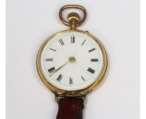Good quality vintage ladies 14ct nurses watch, the enamelled dial with Roman numerals, the engine turned back inlaid with ena
