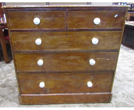 A Victorian stained and scumbled pine bedroom chest of two short over three long graduated drawers, with white ceramic knob h