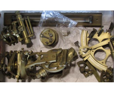 A collection of surveyors tools to include two theodolites, two sextants and others (7) 