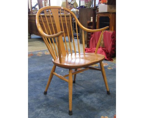 A vintage Ercol light elm and beechwood Windsor hoop and stick back chair makers chair with  central shaped splat 