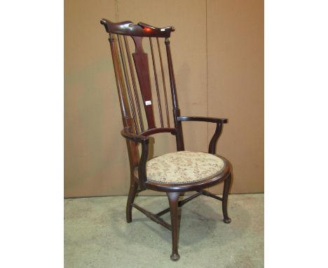 An Edwardian Chippendale Revival mahogany single drop leaf side table with serpentine moulded outline raised on four square c