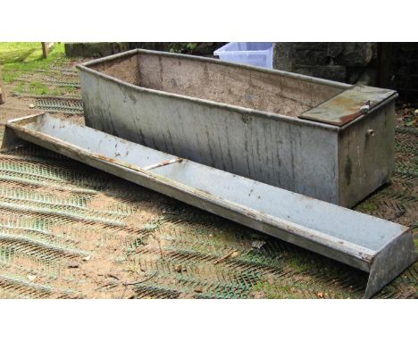 A reclaimed galvanised steel field water trough of rectangular form with rounded rim, 185 cm long x 50 cm wide x 40 cm high, 