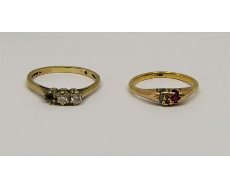 18ct ruby ring, 2.5g (soldered) and a further 9ct diamond ring, 2g (one stone vacant) (2) 