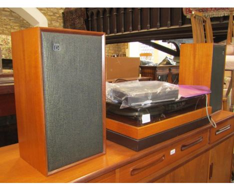 A Dynatron Hifi and Speaker system model BFC202 and a Sony radio ICF-2001D 