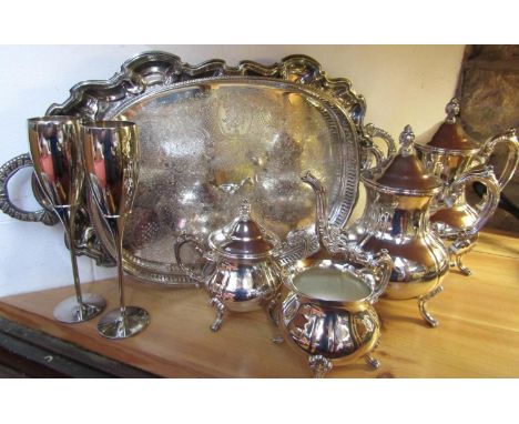 Mixed collection of silver plated items comprising a four piece baluster tea service, a twin handled serpentine tray, a galle