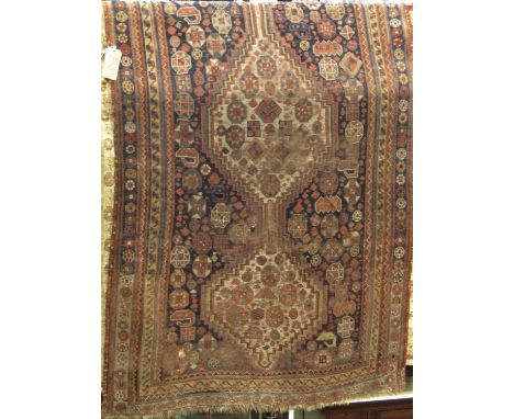 Antique Persian rug/runner with medallion decoration upon a blue ground, 280 x 130 cm 