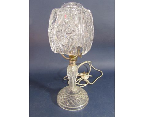Probably Waterford crystal lamp, the square shade with canted corners and star cut detail upon a baluster column, 42 cm high 