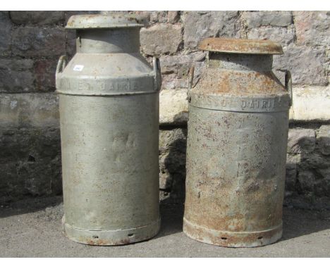Two vintage weathered United Dairies two handled milk churns with painted finish (complete with caps) 74 cm and 67 cm in heig