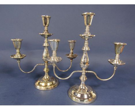 Modern pair of silver twin branch candelabra with central baluster column, maker Argyll silver, Birmingham 1991, 33 cm high (