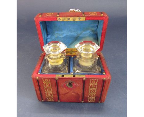 Good novelty glass scent/small decanter box in the form of a domed trunk with Morocco gilt tooled leather and sprung hinge en
