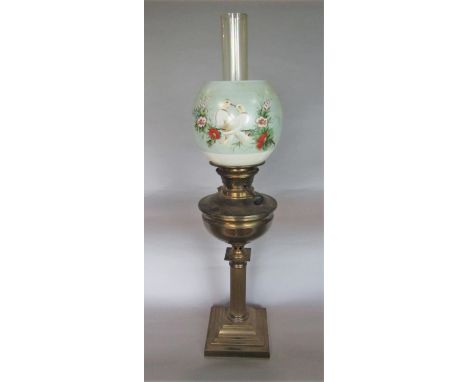 Early 20th century brass Corinthian column oil lamp, the glass shade hand painted with love birds or doves, the knob inscribe