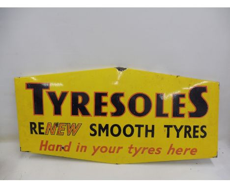A Tyresoles shaped enamel sign, 48 x 24".