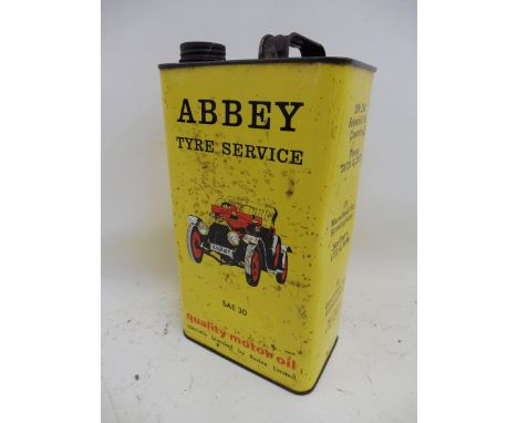 An unusual Abbey Tyre Service SAE30 Motor Oil gallon can with an image of an Edwardian car to both sides. 