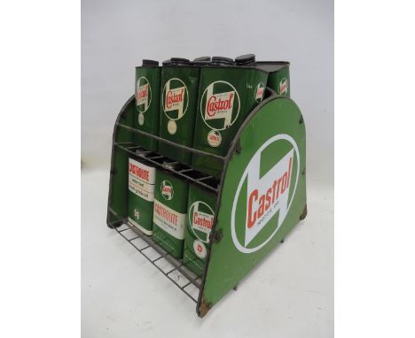 A Castrol Motor Oil forecourt crate with an enamel sign to each end and 12 associated rectangular quart oil cans.
