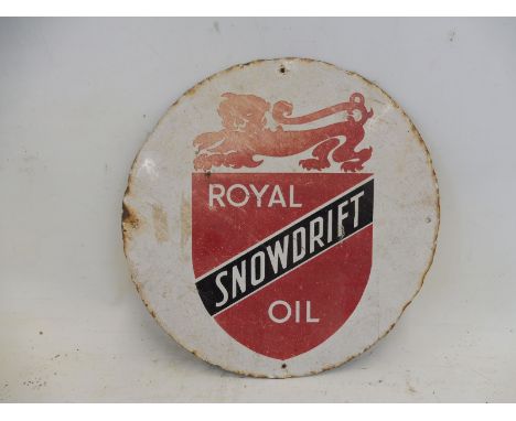 A Royal Snowdrift Oil circular enamel sign for attaching to an oil cabinet, 12" diameter.