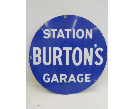 An unusual circular enamel sign advertising Burton's Station Garage, 36" diameter. 
