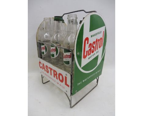 A Wakefield Castrol Motor Oil nine bottle forecourt crate with four enamel signs to the sides and nine Castrol quart glass oi