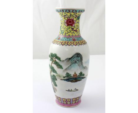 A Chinese porcelain Republic style baluster vase with polychrome enamel stylised floral decoration to yellow ground neck, fig