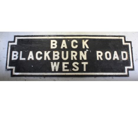 A cast iron vintage street sign 'Back Blackburn Road West', 35 x 105.5cm.