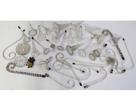 A quantity of clear glass epergne branches and trumpets, some with gilding to the outside.
