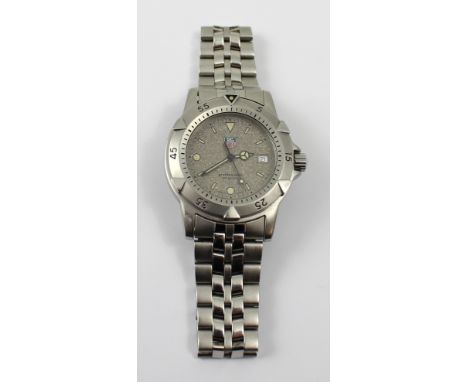 A Tag Professional gentlemen's wristwatch, with stainless steel strap and bezel, numbered to back WD1211-K-20. CONDITION REPO