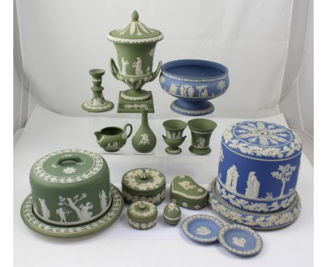 A collection of Wedgwood Jasperware in powder blue and green to include two cheese domes, a Kampala vase and cover, a fruit b