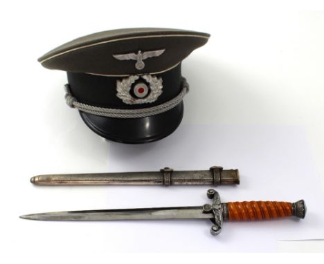 A WWII German second model Luftwaffe officers' dagger with alloy scabbard, blade marked 'W K C Solingen', length 40cm, and a 