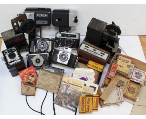 A quantity of vintage cameras and equipment to include a Minolta XL-400 cine camera, a cased box brownie, an Ace 9.5mm Pathes