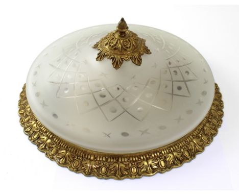 A modern ceiling rose centre light with cut and etched glass shade, with cast brass bezel and boss, diameter 42cm.