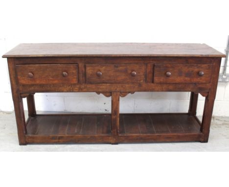 A large modern distressed oak three-drawer dresser with pot-shelf base, width 180cm, height 220cm.