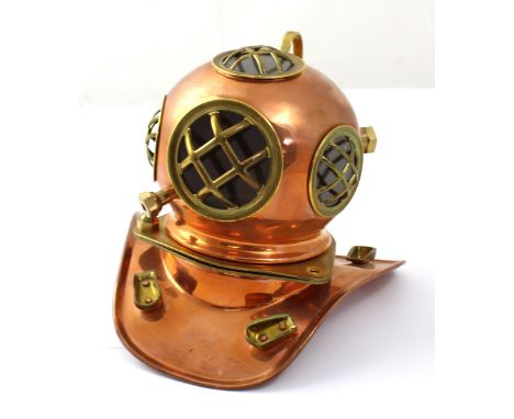 A miniature reproduction copper and brass divers' helmet, height 18cm.