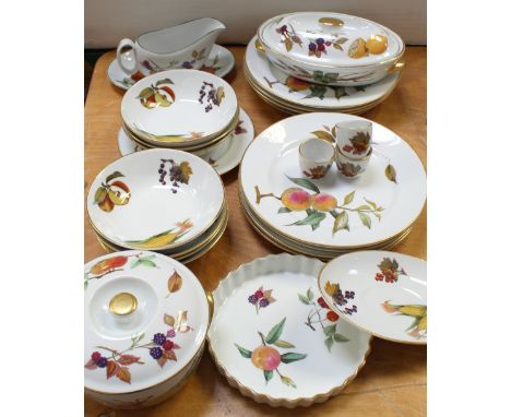 A quantity of Royal Worcester 'Evesham' pattern oven-to-table ware to include dinner plates, cereal bowls, vegetable tureens,