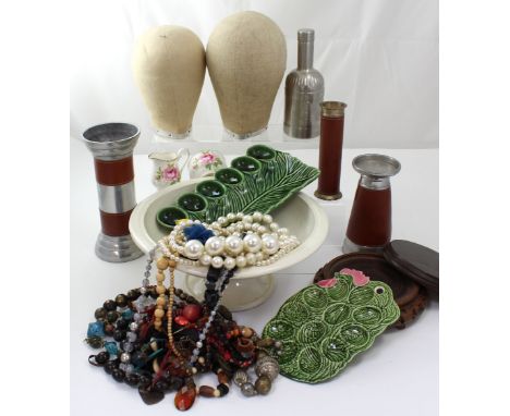 A pair of vintage calico-covered mannequin heads, alloy candlesticks, a Chinese vase stand, ceramic egg trays and fruit bowl 