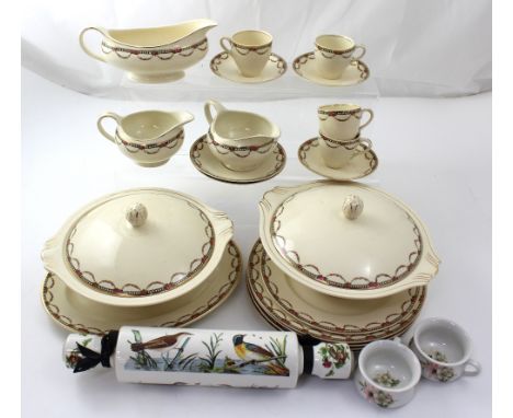 An Edwardian pattern Meakin part dinner service to include tureens, meat plates, dinner plates, saucers and coffee cups, a Po