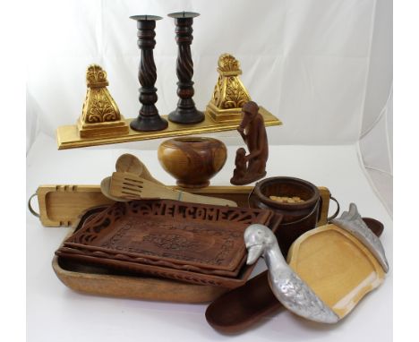 A collection of wooden trays, wooden ornaments, an olivewood bowl, candlesticks, a gilt wood shelf etc (2).