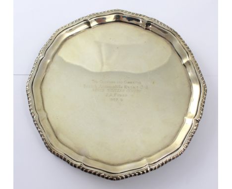 A George V hallmarked silver card tray with gadrooned piecrust edge, Richard Woodman Burbridge, Makers for Harrods Ltd, Londo