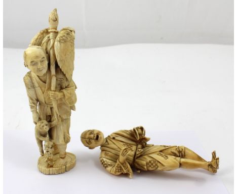 Two 19th century carved ivory figures, one of a man with staff, eagle and monkey, with character mark inset to base, height a