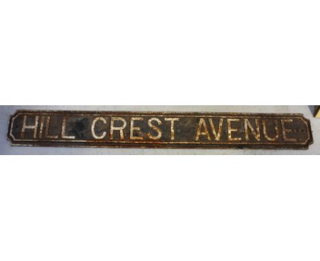 A cast iron vintage street sign 'Hillcrest Avenue', 16 x 127cm.
