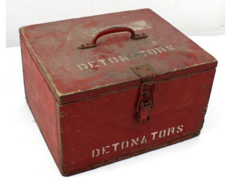 A vintage red painted detonators box, made from seven ply, detailed 'Detonators' to lid and front, width 34.5cm.
