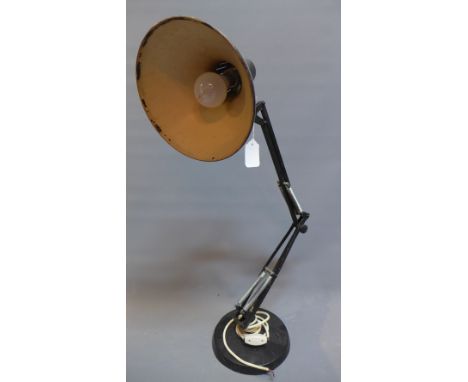 A Black painted metal anglepoise lamp, on circular base, H:7cm (when extended)