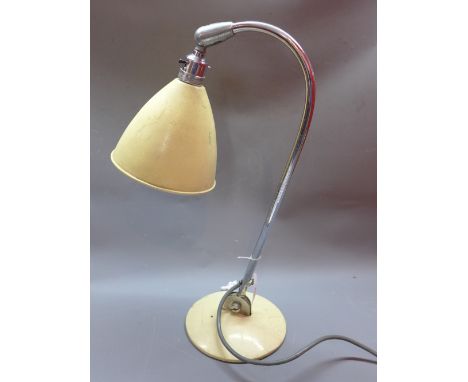 A vintage chrome desk lamp having cream shade