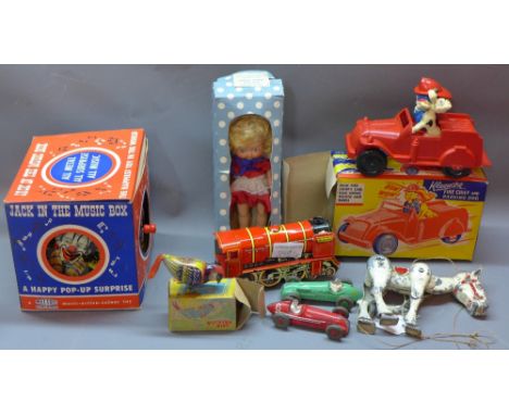 A collection of vintage toys including Muffin the Mule, mechanical Pecking Bird, Pedigree Mary Anne doll and two Dinky racing