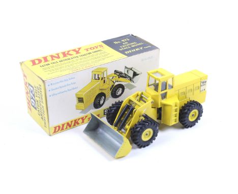 A Dinky diecast EatonYale 6000 Articulated Tractor Shovel. No. 973, yellow body with Yale decals, in original box.