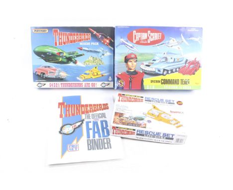 A collection of Thunderbirds toys and collectables. Comprising one Imai thunderbird 4 rescue set model kit, one Matchbox thun
