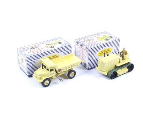 Two Dinky Supertoys diecast toys. Comprising one Euclid rear dump truck no. 965, yellow body with winding handle in working o